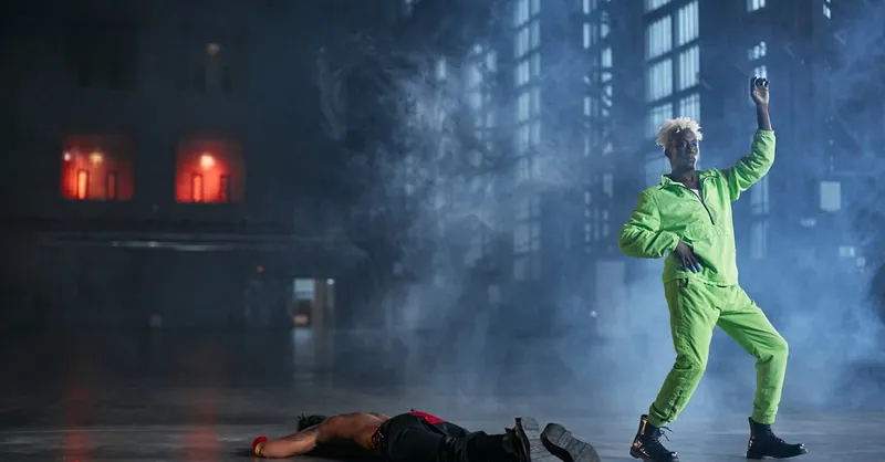Creative stage scene featuring martial arts cosplay with striking poses and smoke effects.